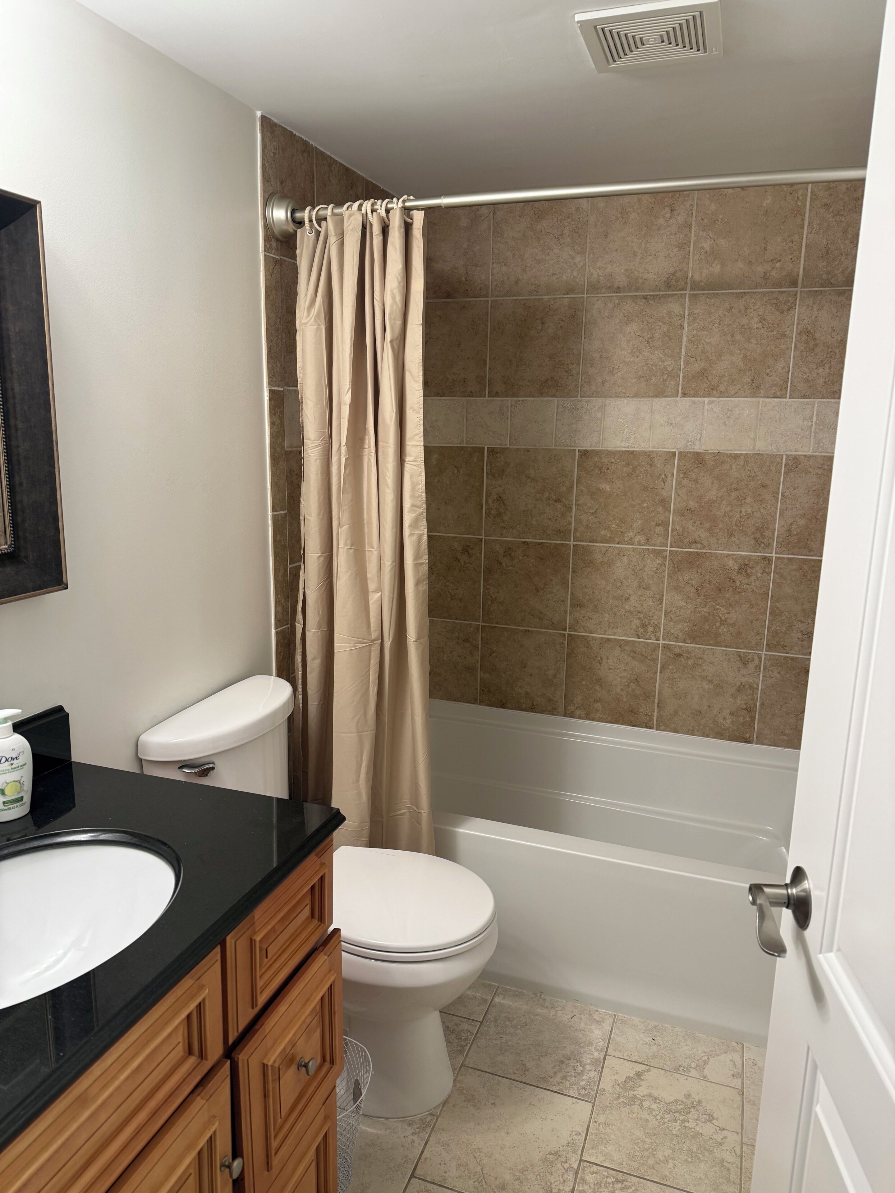 Shower, towels, soap, toilet paper
