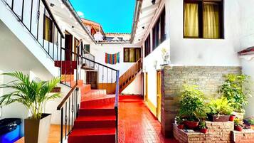 Habitación triple | Terraza o patio