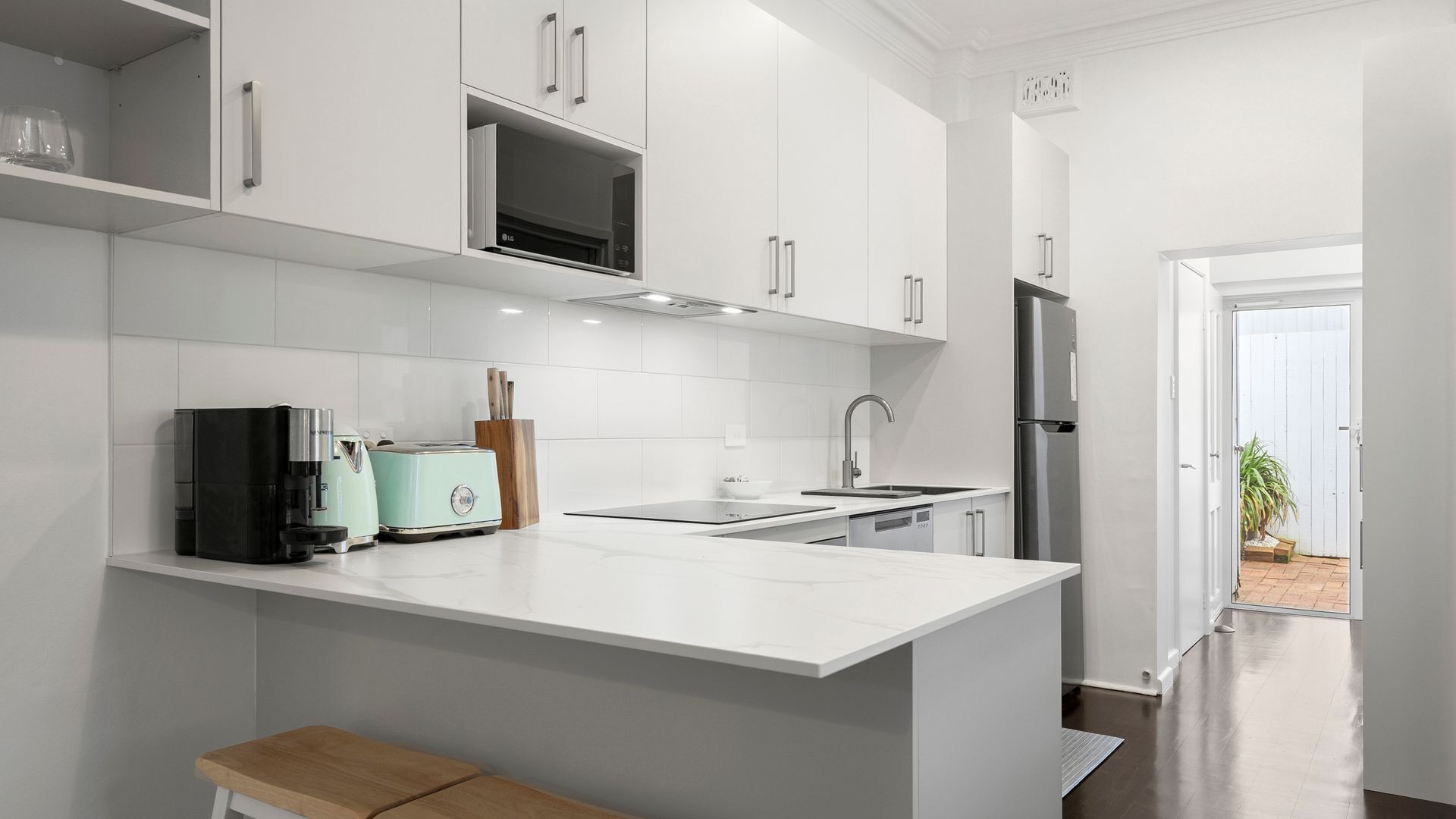 Coffee/tea maker, fridge, microwave, oven