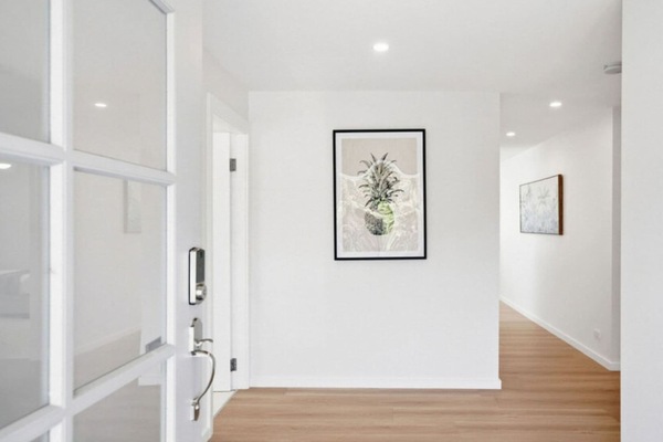 Welcoming entry hallway leading throughout the apartment.