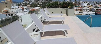 Modern 2BR Antara condo - Rooftop pool- Olas Altas