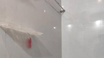 Shower, towels, soap, shampoo