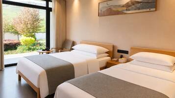 Kamar Twin Comfort | Selimut bulu angsa, tirai kedap cahaya, dan Wi-Fi gratis