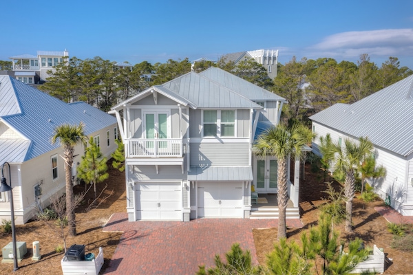 Front exterior view of the two-story coastal home
