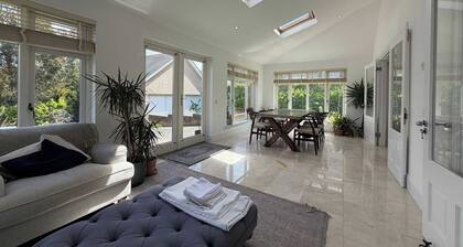 Luxury 4BDR Retreat With Garden and Workspace