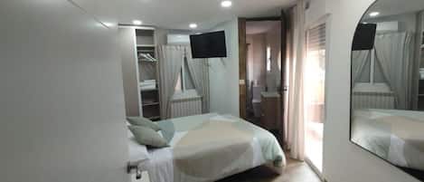 Suite, 1 cama Queen size, balcón | Wifi gratis