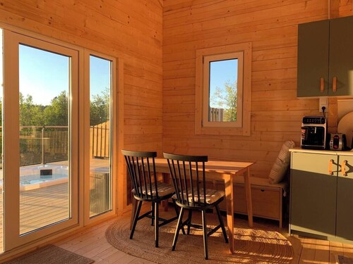 Log cabin with hot tub and views