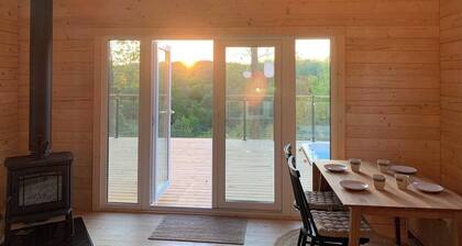Log cabin with hot tub and views