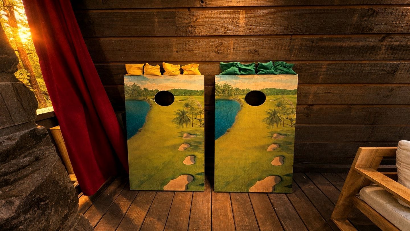 Two wooden doors with tropical beach scenes and a red curtain.
