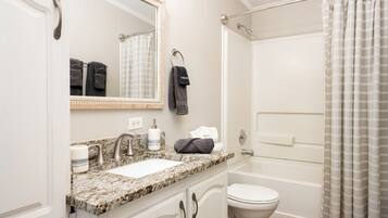 Hair dryer, towels, soap, shampoo