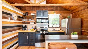 Coffee/tea maker, fridge, microwave, oven