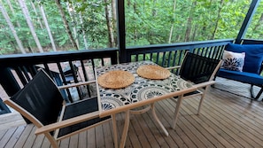 Outdoor dining - Cozy Scandinavian Cabin with EV Charging on 18-Acre Forest Retreat Near The Caverns & Waterfalls, Coalmont, TN (Coalmont)