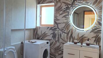 Shower, towels, toilet paper