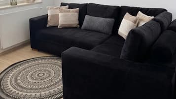 Deluxe Penthouse, City View | Living area