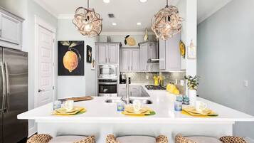 Coffee/tea maker, fridge, microwave, oven