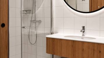 Shower, free toiletries, hair dryer, towels