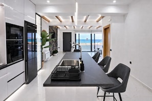 Private kitchen - Villa Horizon.Three-bedroom seafront villa in Crete with unspoiled sea views (Kalives)