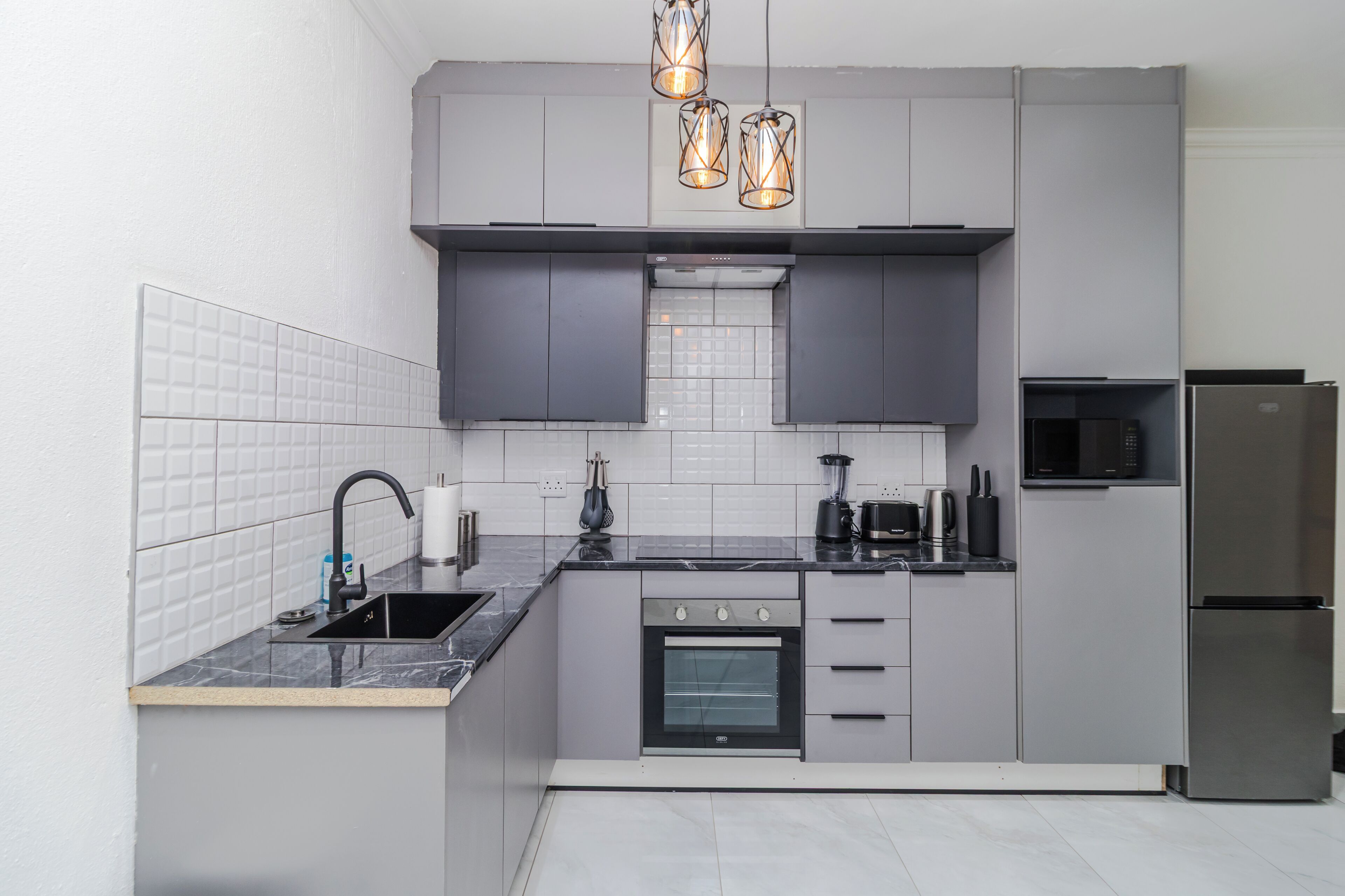 Mini-fridge, microwave, coffee grinder, mixer