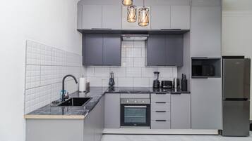 Mini-fridge, microwave, coffee grinder, mixer