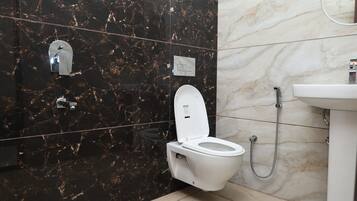 Shower, bidet, towels, soap