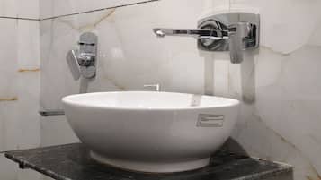 Shower, bidet, towels, soap