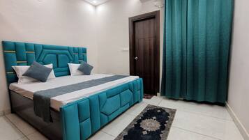 Premium bedding, down comforters, desk, laptop workspace