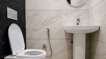 Shower, bidet, towels, soap