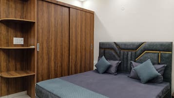 Premium bedding, down comforters, desk, laptop workspace