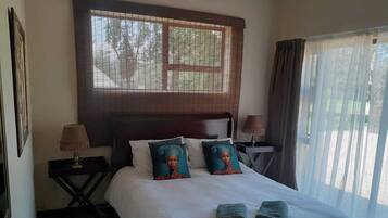 Standard Double Room, Garden View | In-room safe, desk, bed sheets