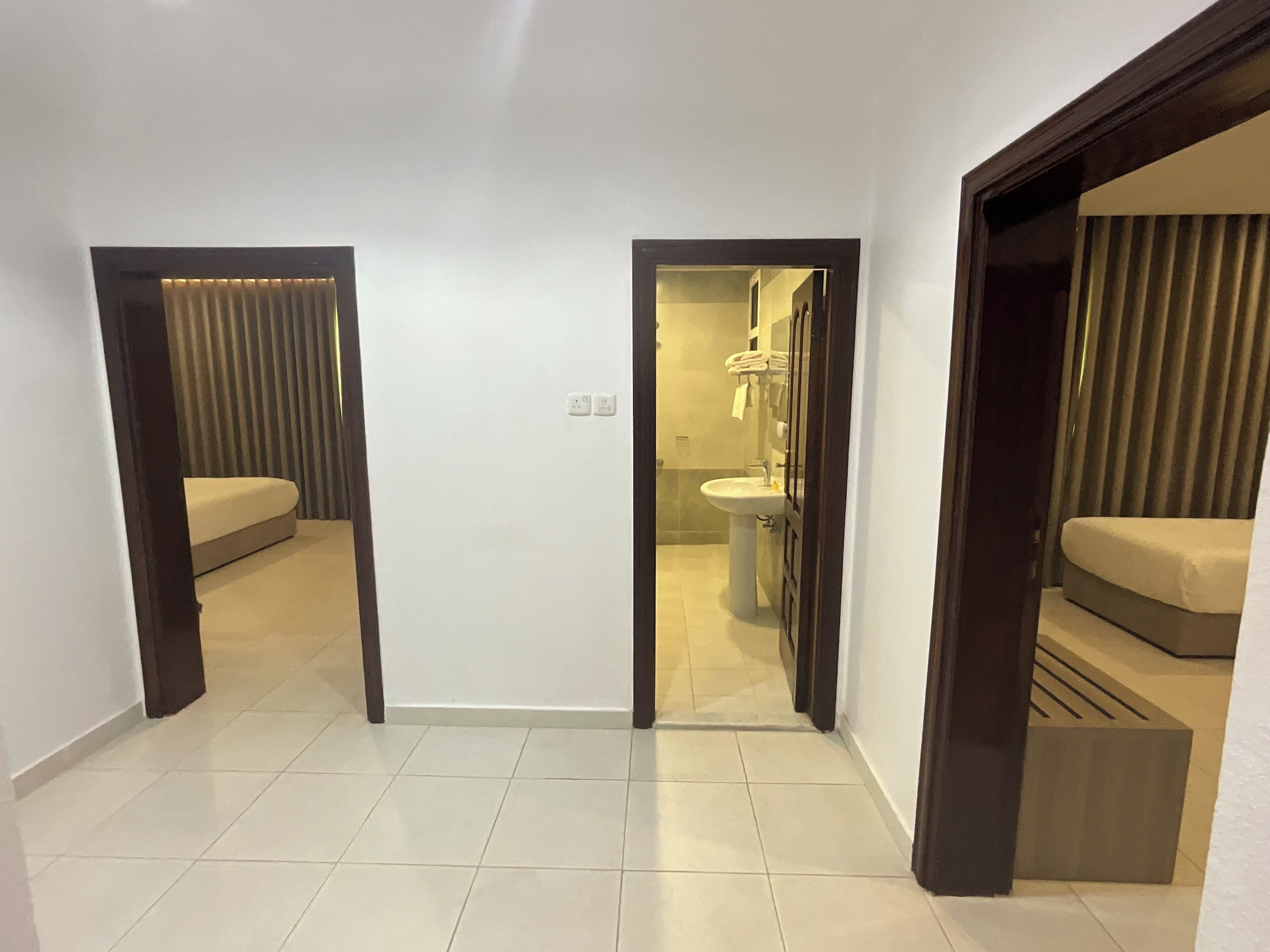 Apartemen Keluarga | Kamar mandi | Handuk, sabun, sampo, dan tisu toilet