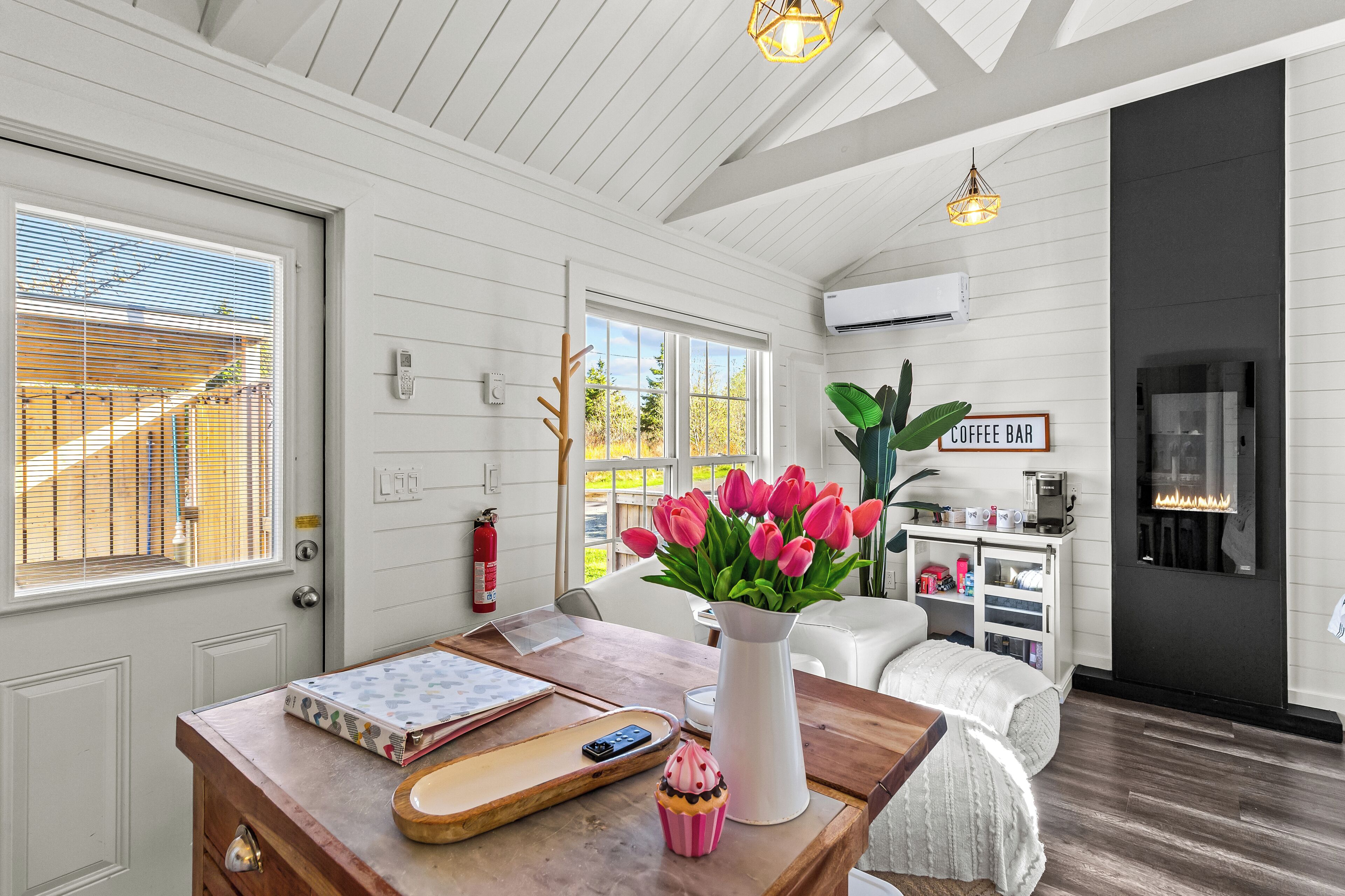 Sun-filled living space with vaulted ceilings and relaxing vibes