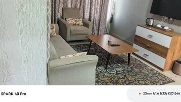 Junior studio suite, uitzicht op de stad | Woonruimte