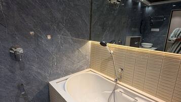 Suite | Bathroom | Free toiletries, soap