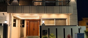 Spacious 3BR Home in DHA Rahbar - WiFi, Parking & 24/7 Support