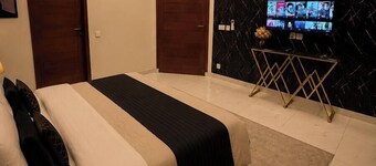 Spacious 3BR Home in DHA Rahbar - WiFi, Parking & 24/7 Support
