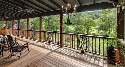 BEAUTIFUL SETTING - RIVER FRONT W/FIRE PIT!