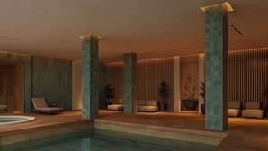 A modern indoor pool area with seating and a jacuzzi. - The House Hotel Kakheti  (Kvareli)
