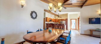 Welcome in the island breeze or head outside to sit on the large deck,