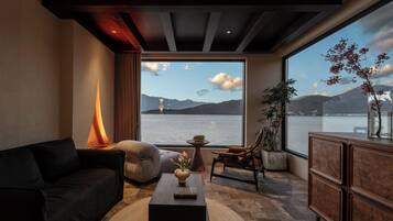 Habitación doble superior, vistas al mar | Zona de estar
