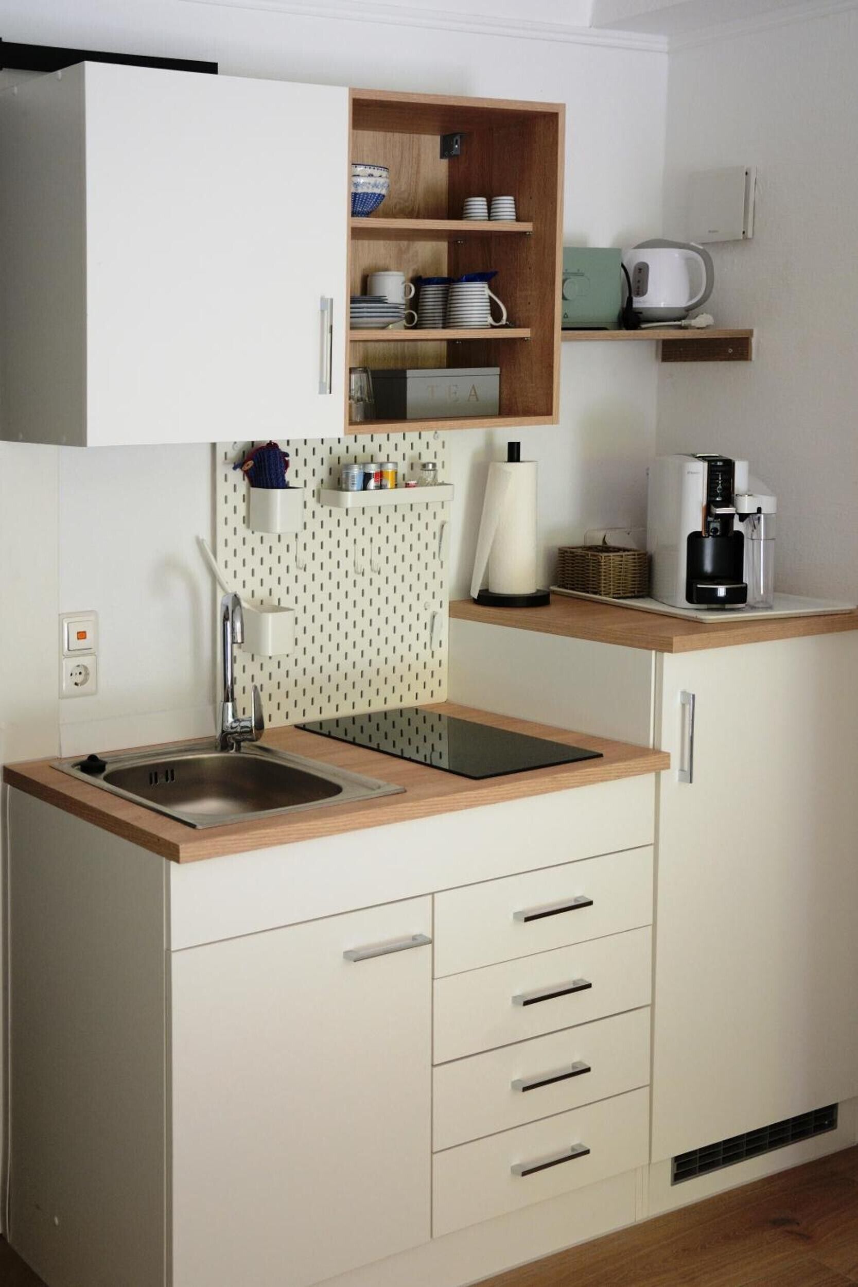 Fridge, stovetop, coffee/tea maker, electric kettle