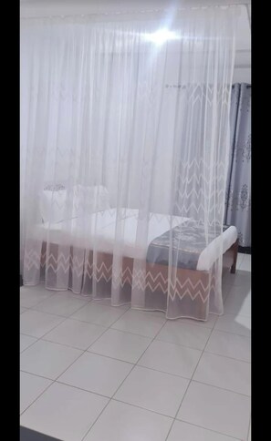 Habitación Deluxe con 1 cama matrimonial o 2 individuales, vista al jardín