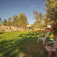 Quarto casal ou duplo luxo, vista para o jardim | Área infantil