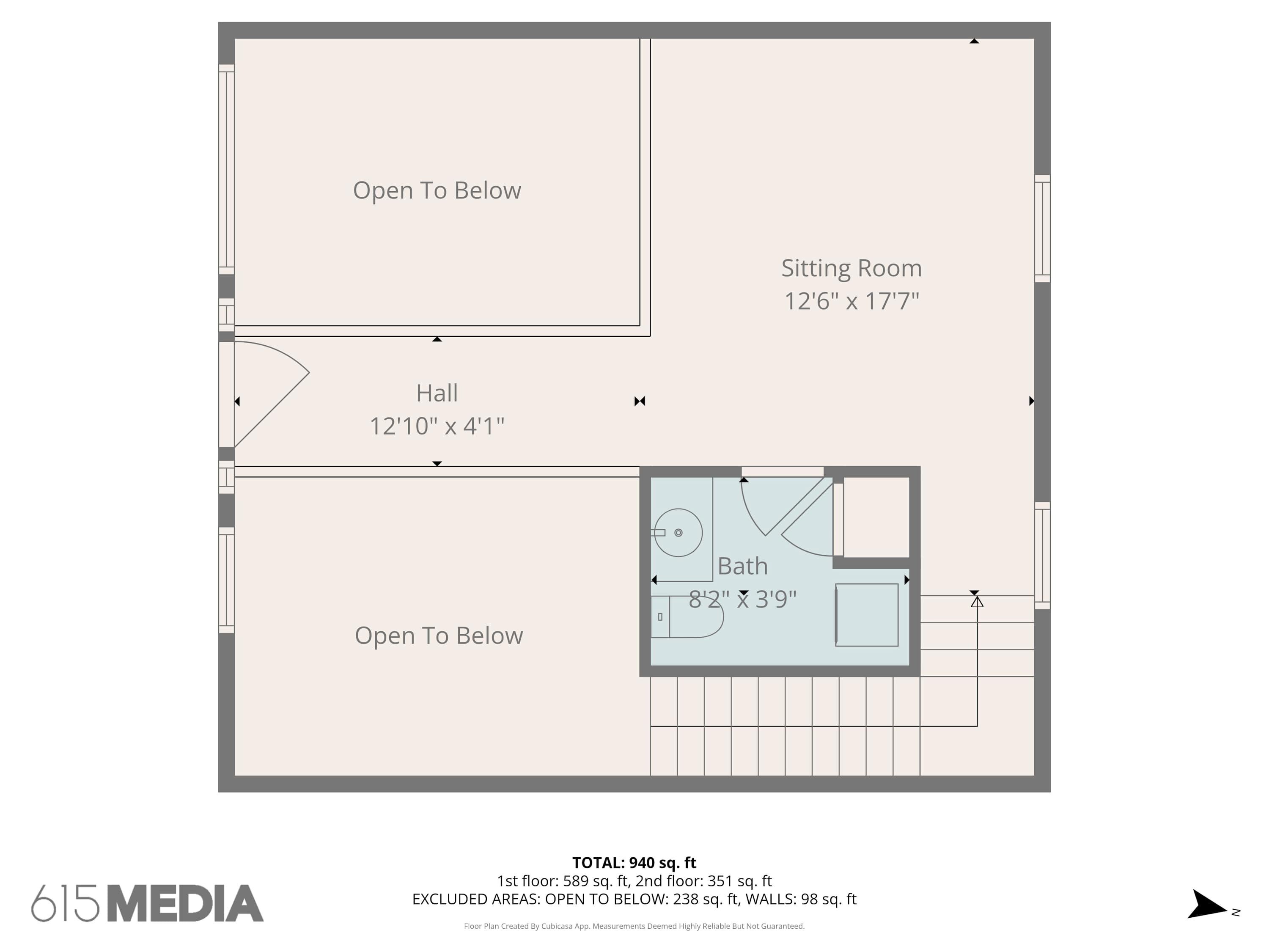 A floor plan of a hotel with a sitting room, hall, and bathroom.