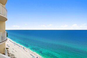 A beachfront hotel with a balcony overlooking the ocean. - Aqua 2009 Oceanfront Primary King Bedroom/High Clean Standard/Wifi (Panama City Beach)