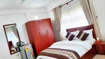 Standard Double Room, Balcony, Garden View | In-room safe, desk, laptop workspace, blackout curtains
