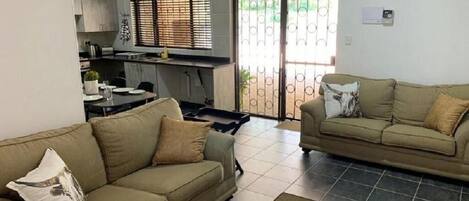Apartment, 2 Bedrooms, Smoking, Garden View | Living room