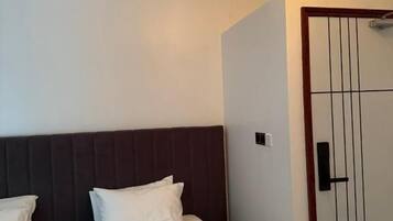 Deluxe Twin Room, Balcony, City View | Iron/ironing board, free WiFi
