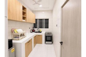 Private kitchen - Modern Two-Bedroom Apartment | Starlink Wi-Fi (Tamale)
