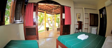 Comfort Room, Air conditioning, Garden View | Free WiFi