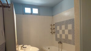 A bathroom with a sink, bathtub, and shower. - Geronymos Stone Villa Pool Chania Apokoronas Crete (Fres)